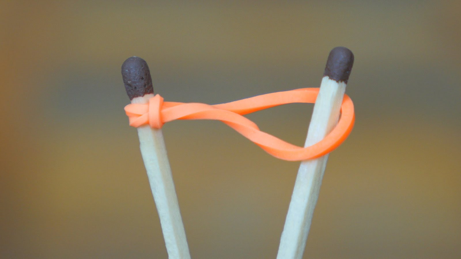 How to Light a Match with a Rubber band