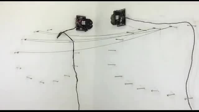 Fascinating video shows robots weaving a hammock together