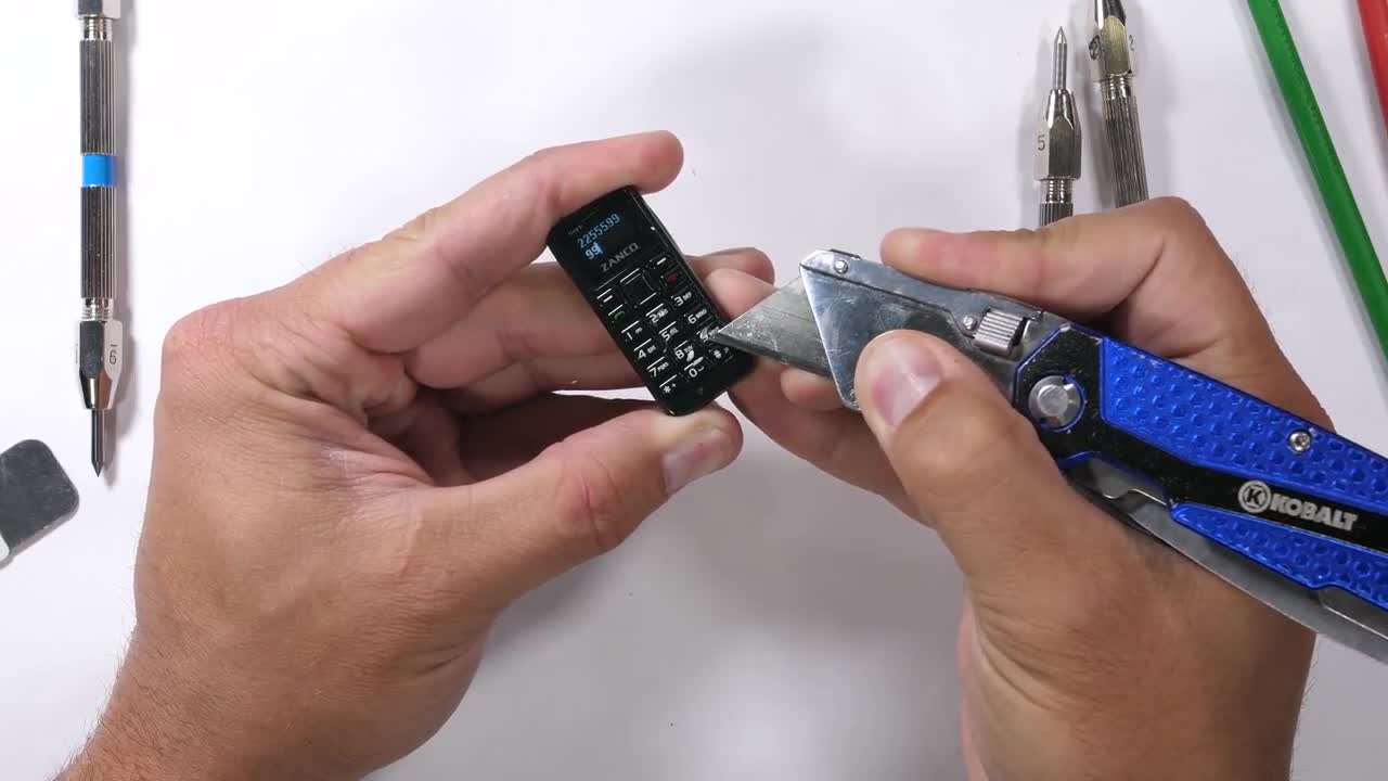 World's SMALLEST Cell Phone Durability Tested!!
