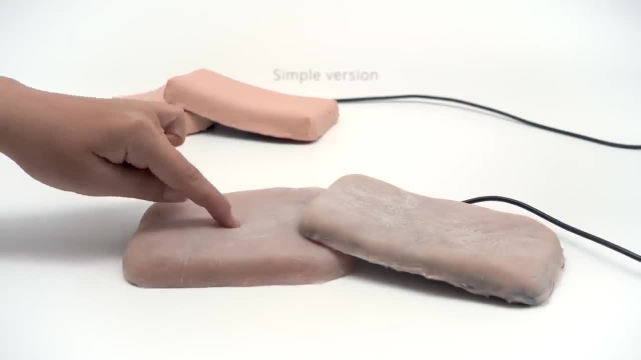 A mobile device covered with human skin Skin On Interfaces