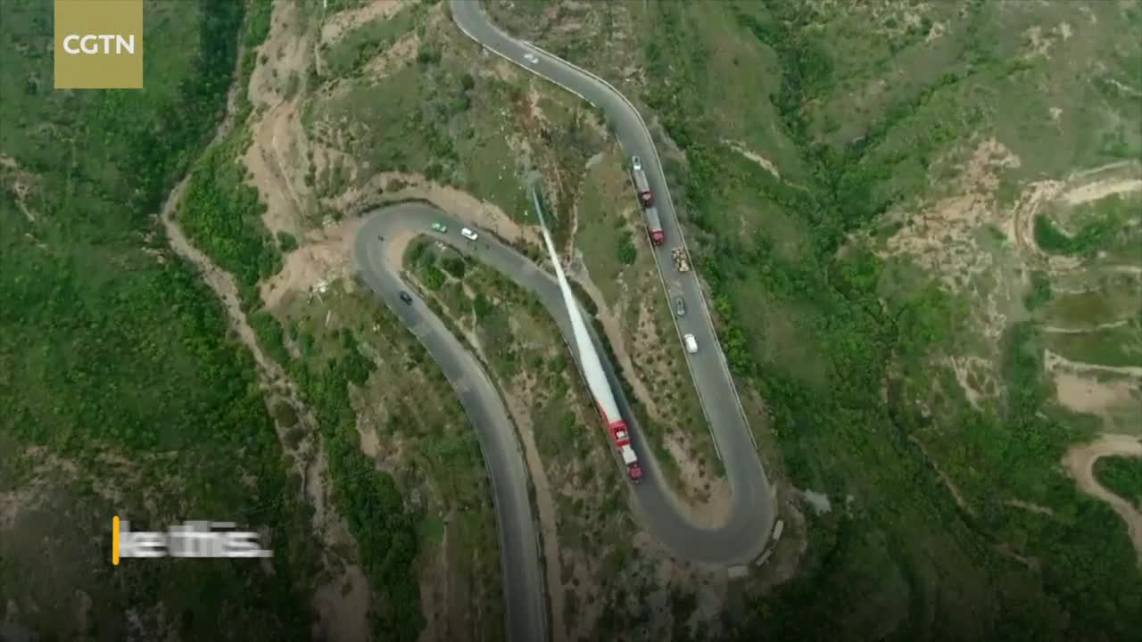 How are wind turbine blades transported to mountains