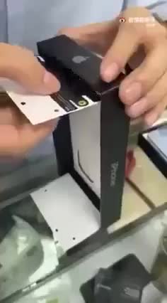 Cận cảnh quy trình làm giả tem niêm phong của Apple